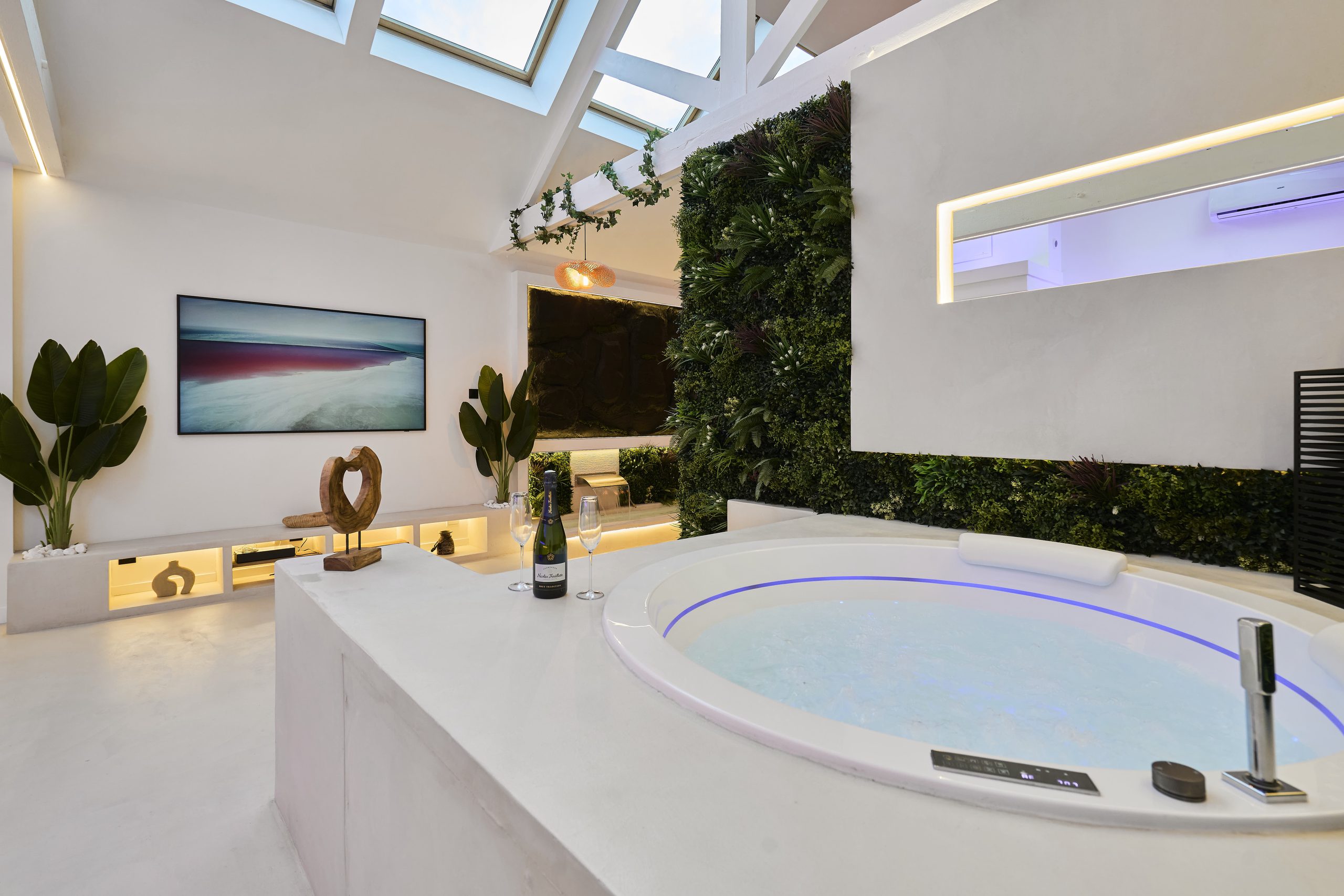 Jacuzzi rond et champagne